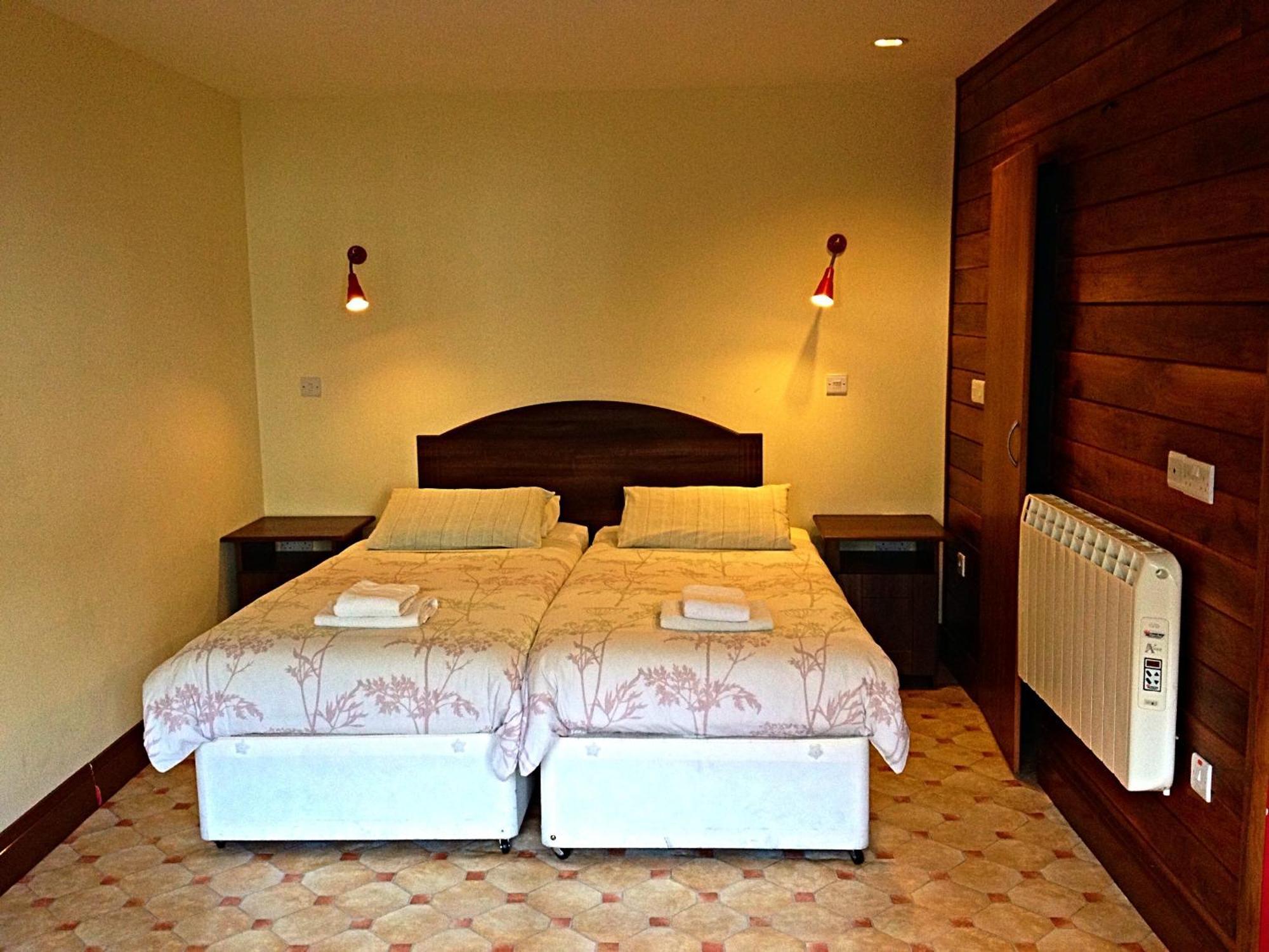 Cashel Town Center Inn Номер фото